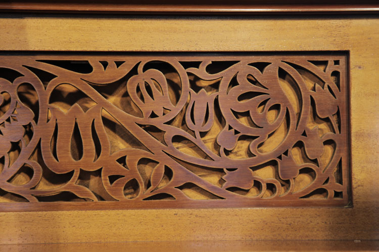 Bechstein  fretwork front panel in a stylised, floral cut-out design