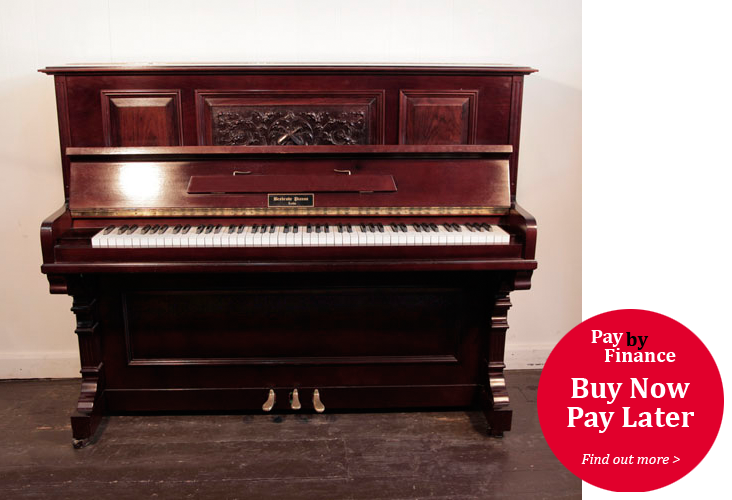 Besbrode Upright Piano For Sale with a Mahogany Case and Carved, Front Panel in a Neoclassical Design