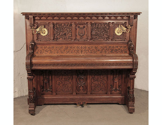 Renaissance style, Gebruder Knake upright piano for sale with an ornately carved, oak case