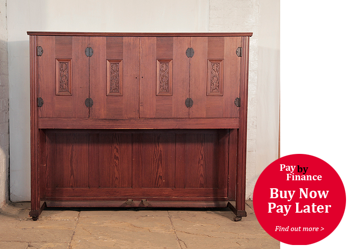 Mayer upright piano for sale with an Arts and Crafts style cabinet with carved panels and decorative hinges and candlesticks 