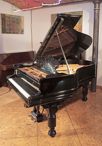 Antique, 1885, Steinway Model A Grand piano for sale with a black case, filigree music desk and fluted, barrel legs