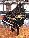 Piano for sale. Restored, 1898, Steinway Model B grand piano with a black case, filigree music desk and elephant legs.