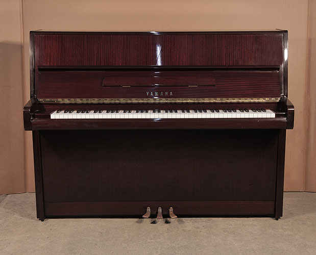 Yamaha E116 upright Piano for sale.