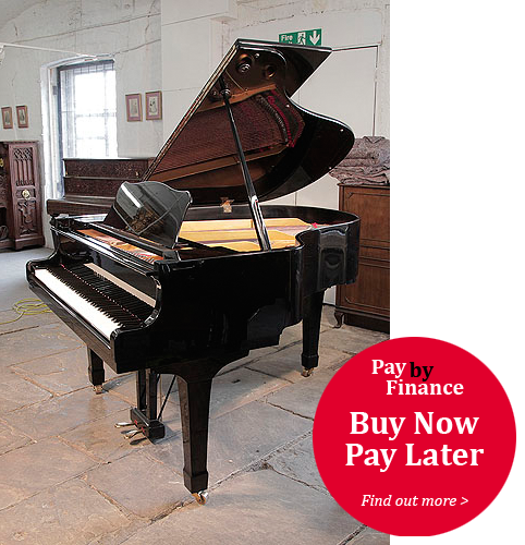 Yamaha G2 grand piano for sale with a black case and polyester finish.