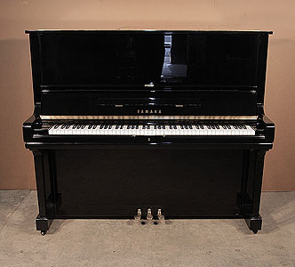  A 1972, Yamaha U3 upright piano with a black case and polyester finish. Piano has an eighty-eight note keyboard and three pedals.