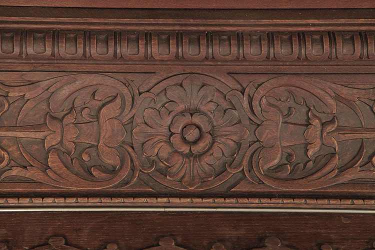 Georg Fortner  cabinet featuring carved flowers and foliage and strapwork