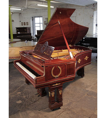 Empire style, 1901, Ibach model 2 grand piano for sale with a mahogany case and gate legs. Entire cabinet decorated with ormolu mounts depicting scenes of greek gods, goddesses and wreaths. 