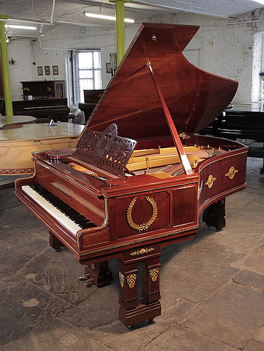 Empire style, 1901, Ibach model 2 grand piano for sale with a mahogany case and gate legs. Entire cabinet decorated with ormolu mounts featuring scenes of greek gods and goddesses and wreaths. 