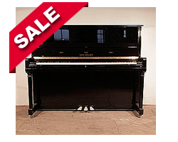  Karl Muller Upright Piano For Sale with a Black Case and Brass Fittings. Piano has an eighty-eight note keyboard and three pedals.