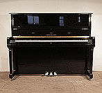 Piano for sale. Karl Muller Upright Piano For Sale with a Black Case and Brass Fittings.