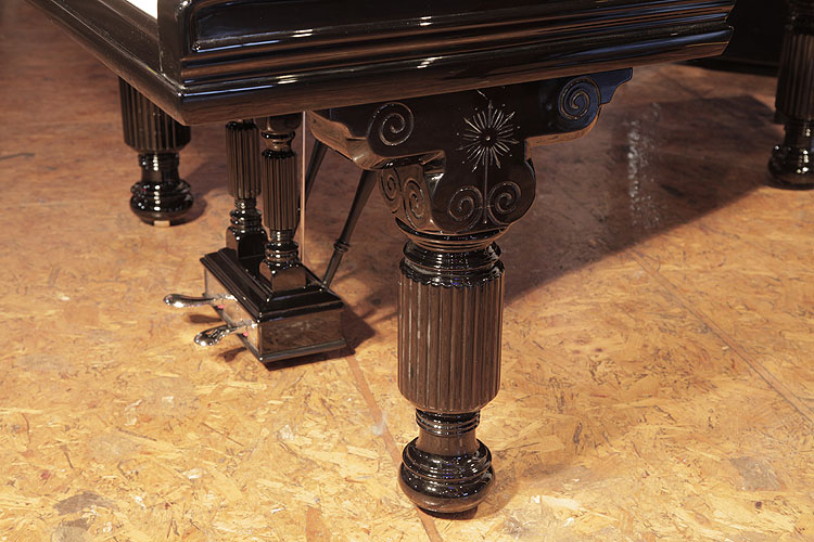 Steinway Model A fluted, barrel piano leg with a pediment carved with spirals and acentral flower. We are looking for Steinway pianos any age or condition.