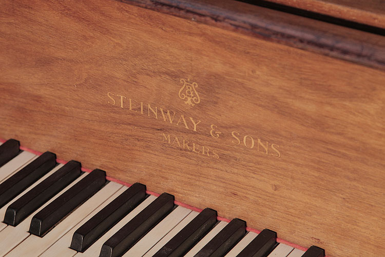 Steinway  Model O  manufacturers name on fall. We are looking for Steinway pianos any age or condition.