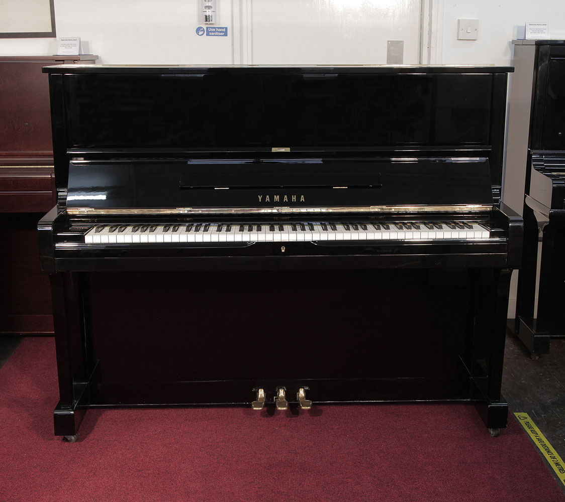 Yamaha U1 Upright piano for sale with a black case and polyester finish