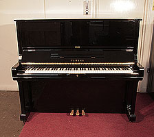Reconditioned, 1984, Yamaha U3 upright piano for sale with a black case and brass fittings. Piano has an eighty-eight note keyboard and three pedals.