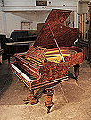 An 1898, Bechstein model V grand piano for sale with a burr walnut case, filigree music desk and turned, faceted legs