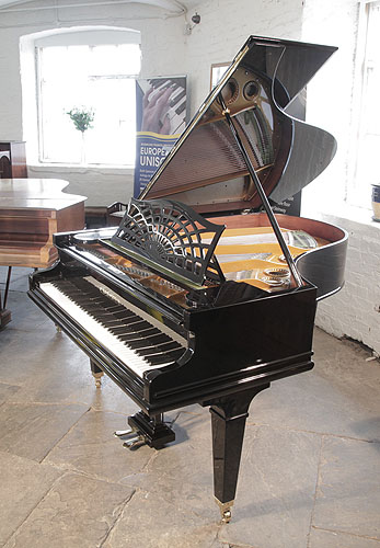 Restored,  1924,  Bechstein Model A1 grand piano with a black case, cut-out music desk in a sunset design and square, tapered legs