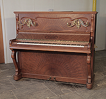 Art Nouveau style, Focke upright piano for sale with a sunburst walnut case and ornate, brass candlesticks