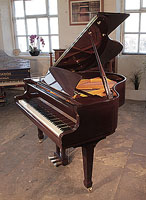 A Bentley GP142 baby grand piano for sale with a mahogany case and spade legs