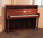 Piano for sale. 
Mid Century Modern style, 1956, Monington and Weston upright piano for sale with a mahogany and macassar ebony case. Piano has an eighty-five note keyboard and two pedals.  