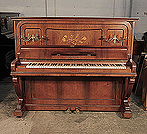 Piano for sale. A 1904, Ronisch upright piano for sale with a rosewood case and ornate brass candlesticks. Front panel features bespoke inlay of roses, thistles and shamrocks. Piano has an eighty-eight note keyboard and two pedals.