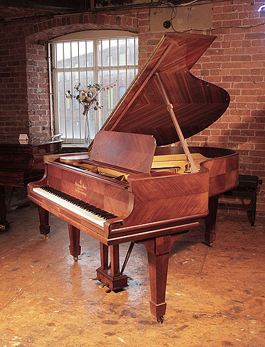 A 1905, Steinway Model A grand piano for sale with a quartered, kingwood case and spade legs. Piano has an eighty-eight note keyboard and a two-pedal lyre.