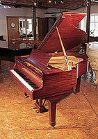 A 1937, Steinway Model S baby grand piano with a mahogany case and spade legs. Piano has an eighty-eight note keyboard and a two-pedal lyre.    