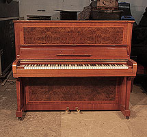 A 1939, Steinway Model V upright piano for sale with a polished, walnut case and figured walnut front panel. Piano has an eighty-eight note keyboard and two pedals. 