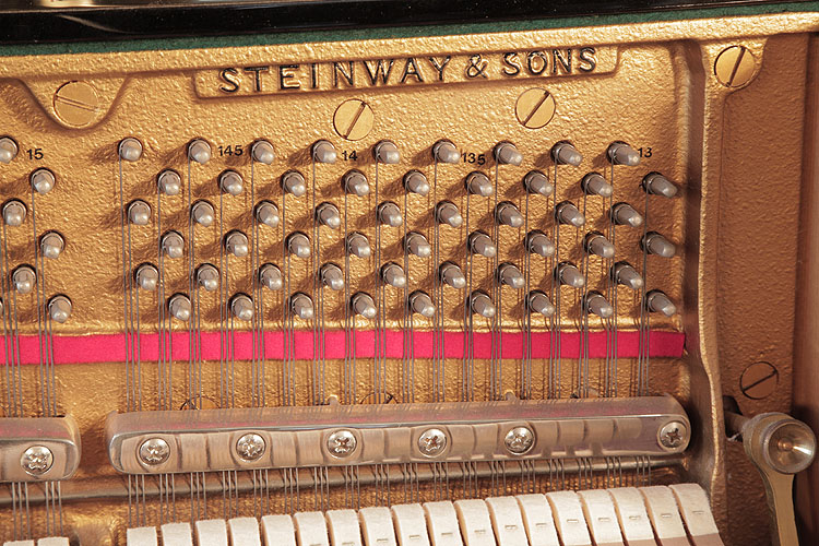 Steinway piano manufacturer's name on frame .