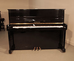  Yamaha P116 upright piano for sale with a black case and brass fittings