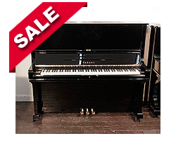 Piano for sale. A 1980, Yamaha U3 upright piano for sale with a black case and brass fittings. Piano has an eighty-eight note keyboard and three pedals.  