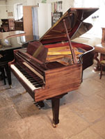 Reconditioned,  1992, Bluthner model 10 grand piano for sale with a mahogany case and spade legs.