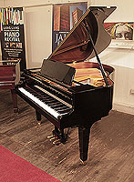 Reconditioned,  2009, Kawai GM-10K baby grand piano for sale with a black case and square, tapered legs