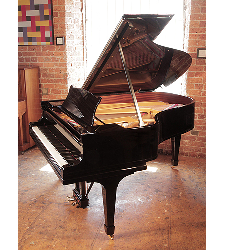 Rebuilt, 1928, Steinway Model A grand piano for sale with a black case and spade legs. Piano has an eighty-eight note keyboard and a three-pedal lyre. 