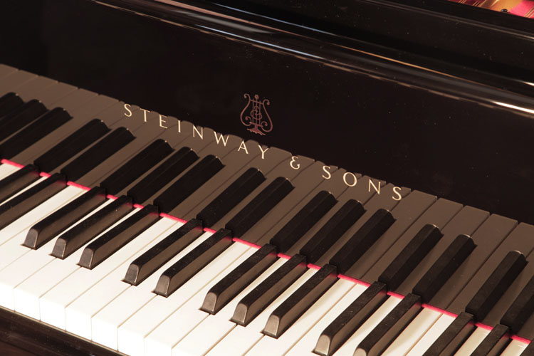 Steinway Model A piano manufacturers logo on fall. We are looking for Steinway pianos any age or condition.