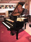 Rebuilt, 1905, Steinway Model O grand piano for sale with a black case and spade legs. Piano has an eighty-eight note keyboard and a two-pedal lyre.
 