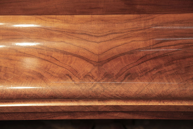 Steinway  Model S walnut wood grain. We are looking for Steinway pianos any age or condition.