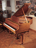 Crown Jewel Collection, 1997, Steinway Model S baby grand piano for sale with a polished, walnut case and spade legs Piano has an eighty-eight note keyboard and a three-pedal lyre.  