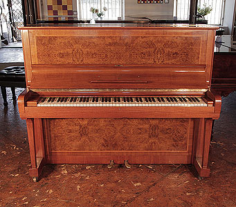 Besbrode Pianos is a Specialist Steinway & Sons  Dealer. A 1939, Steinway Model V upright piano for sale with a polished, figured walnut case.