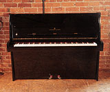 Reconditioned, 1981, Steinway Model Z upright piano with a black case and brass fittings. Piano has an eighty-eight note keyboard and two pedals.onditioned, 1981, Steinway Model Z upright piano with a black case and brass fittings. Piano has an eighty-eight note keyboard and two pedals. 