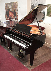 Reconditioned, 2001, Yamaha C1 baby grand piano for sale with a black case and spade legs. Piano has a fitted Disklavier Mark III and Silent System.