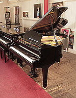 A 1978, Yamaha G2 grand piano for sale with a black case and spade legs. Piano has an eighty-eight note keyboard and a two-pedal lyre.