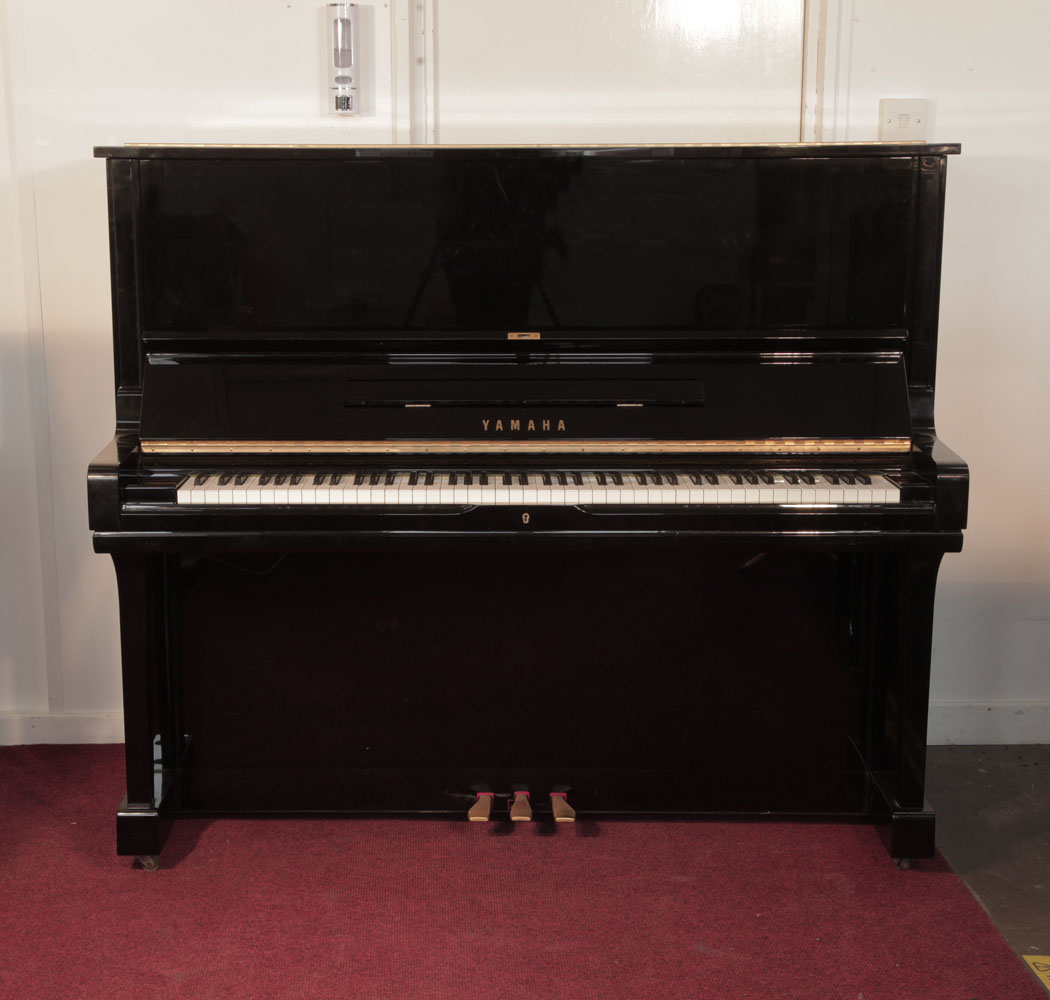 Yamaha U3 upright piano for sale with a black case and brass fittings