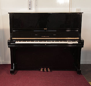 Reconditioned, 1986, Yamaha U3 upright piano for sale with a black case and brass fittings