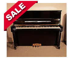 Young Chang E-118 Upright Piano For Sale with a Black Case and Brass Fittings