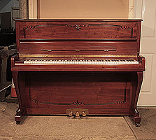 Young Chang E-118 upright piano for sale with a mahogany case and cabriole legs.