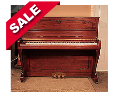 Young Chang E-118 upright piano for sale with a mahogany case and cabriole legs.