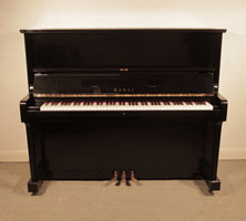 Reconditioned, 1973, Kawai BL-51 upright piano with a black case and polyester finish. Piano has an eighty-eight note keyboard and three pedals. 