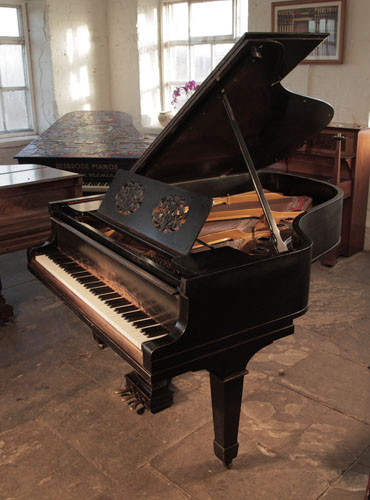 Unrestored, 1921, Steinway Model A grand piano for sale with a black case, cut-out music desk in a floral design and spade legs