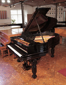 Rebuilt, 1883, Steinway Model A grand piano for sale with a black case, filigree music desk and fluted, barrel legs