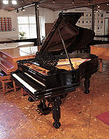 An 1883, Steinway Model A grand piano for sale with a black case, filigree music desk and fluted, barrel legs. Piano has an eighty-five note keyboard and a two-pedal lyre.